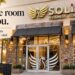 SOLiX storefront with golden phoenix signage. Campaign text: A little room for you. A simple guide to your first SOLiX visit.